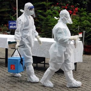 Medics collect Swab sample of COVID-19 patients and walk towards Laboratory at Mahendra Mohan Choudhury Hospital (MMCH), during the ongoing nationwide COVID-19 lockdown in Guwahati on Wednesday. (ANI Photo)