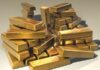 International gold prices dipped on reports China paused buying